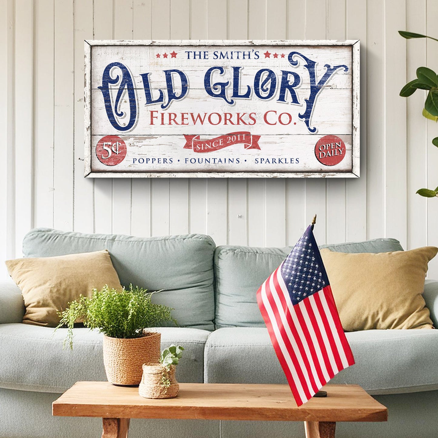 Old Glory Fireworks Co canvas sign with distressed white frame in red and blue Tailored Canvases on Tampa Home & Garden Store