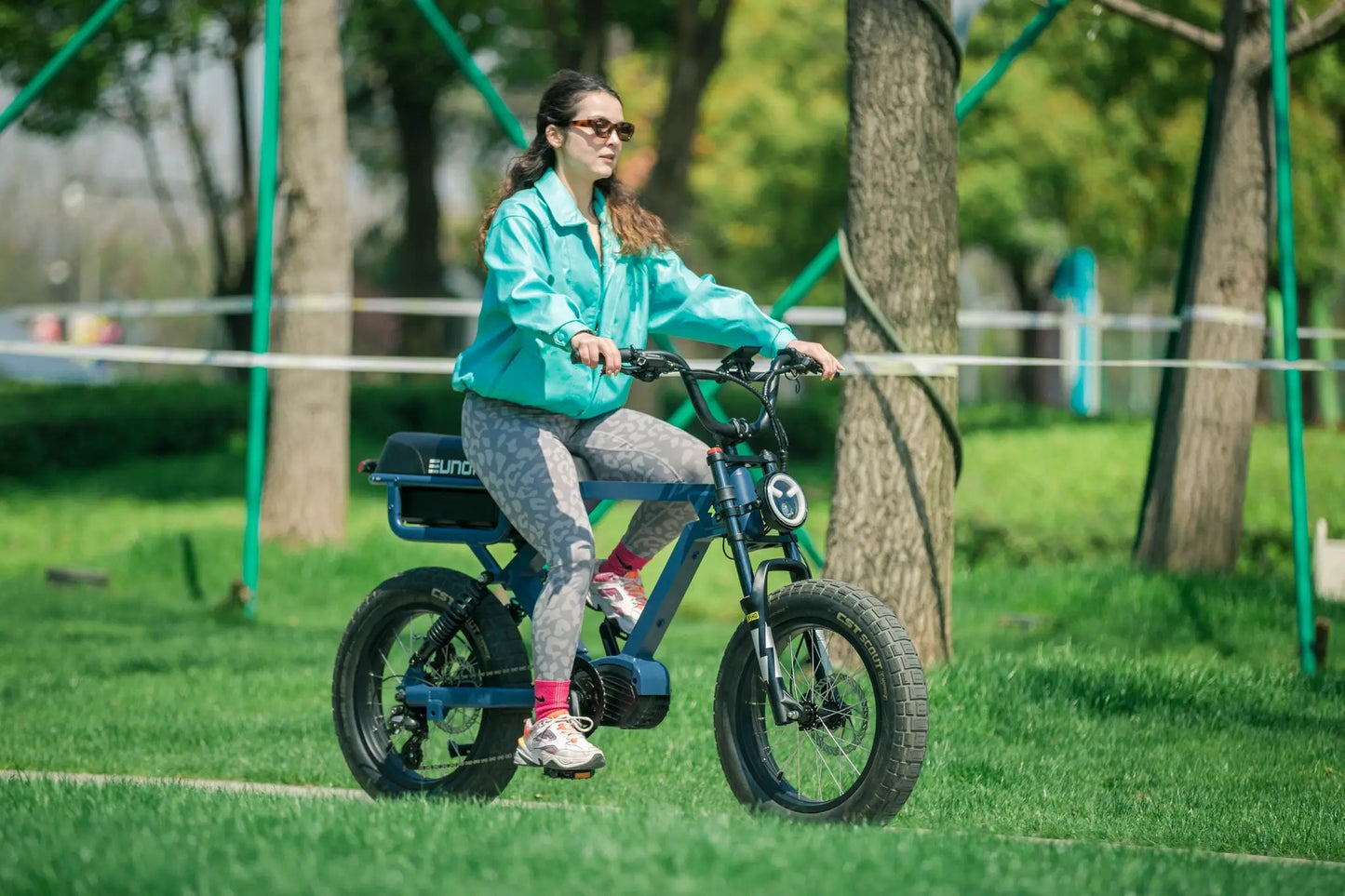 FLASH LITE 2.0 electric bicycle by EUNORAU E-BIKE US with fat tires rider in jacket on Tampa Home & Garden Store