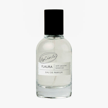 UpCircle Flaura Eau De Parfum bottle with black cap and clear glass on Tampa Home & Garden Store
