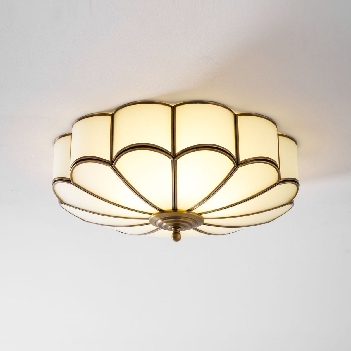 Flower-shaped frosted glass ceiling light with brass frame by Moktan Sabai on Tampa Home & Garden Store