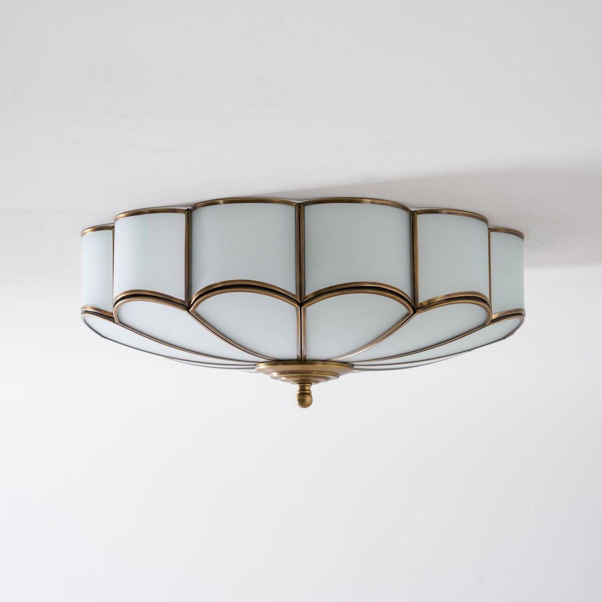 Flower shape frosted glass ceiling light with brass frame Moktan Sabai, soft ambient glow on Tampa Home & Garden Store