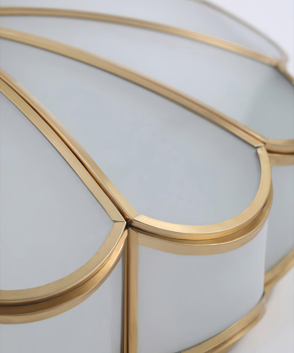 Flower-shaped frosted glass ceiling light with brass frame and gold ring accents on Tampa Home & Garden Store