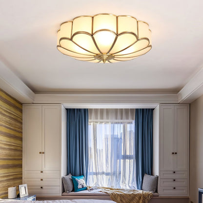 Flower-shaped frosted glass ceiling light with brass frame Moktan Sabai warm ambient glow on Tampa Home & Garden Store