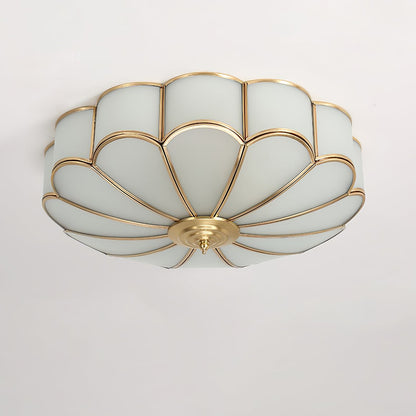 Flower-shaped frosted glass ceiling light with brass frame for soft ambient glow on Tampa Home & Garden Store