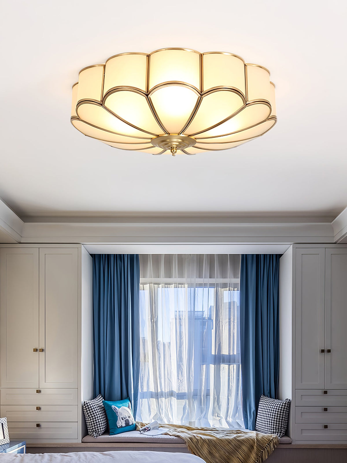 Flower-shaped frosted glass ceiling light with brass frame, warm ambient glow, Moktan Sabai on Tampa Home & Garden Store