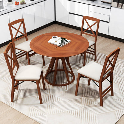 Folding dining chairs set of 4 with padded seats and rubber wood frames around a round table on Tampa Home & Garden Store
