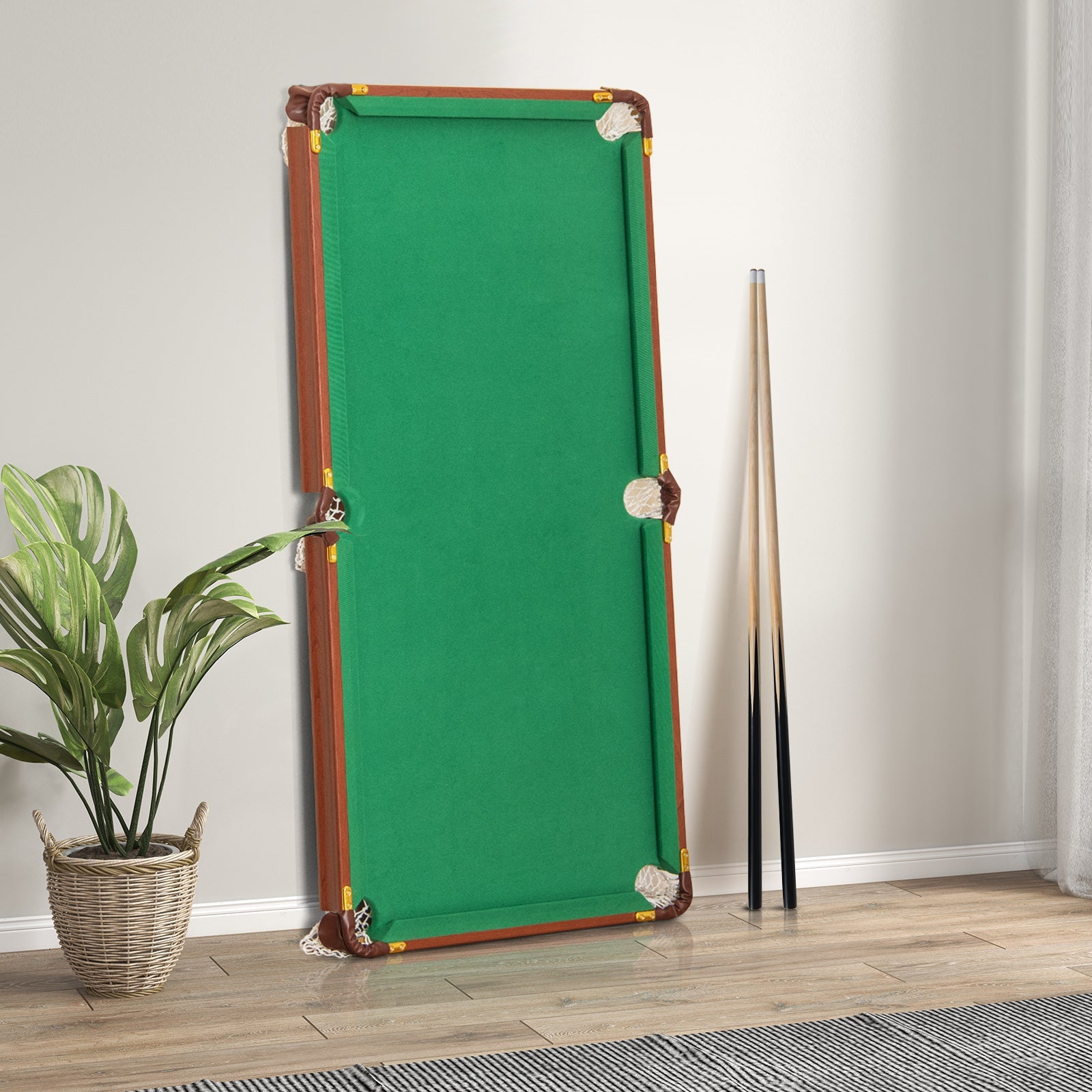 DirectDeals folding portable billiards table with green felt, adjustable feet and three cues on Tampa Home & Garden Store