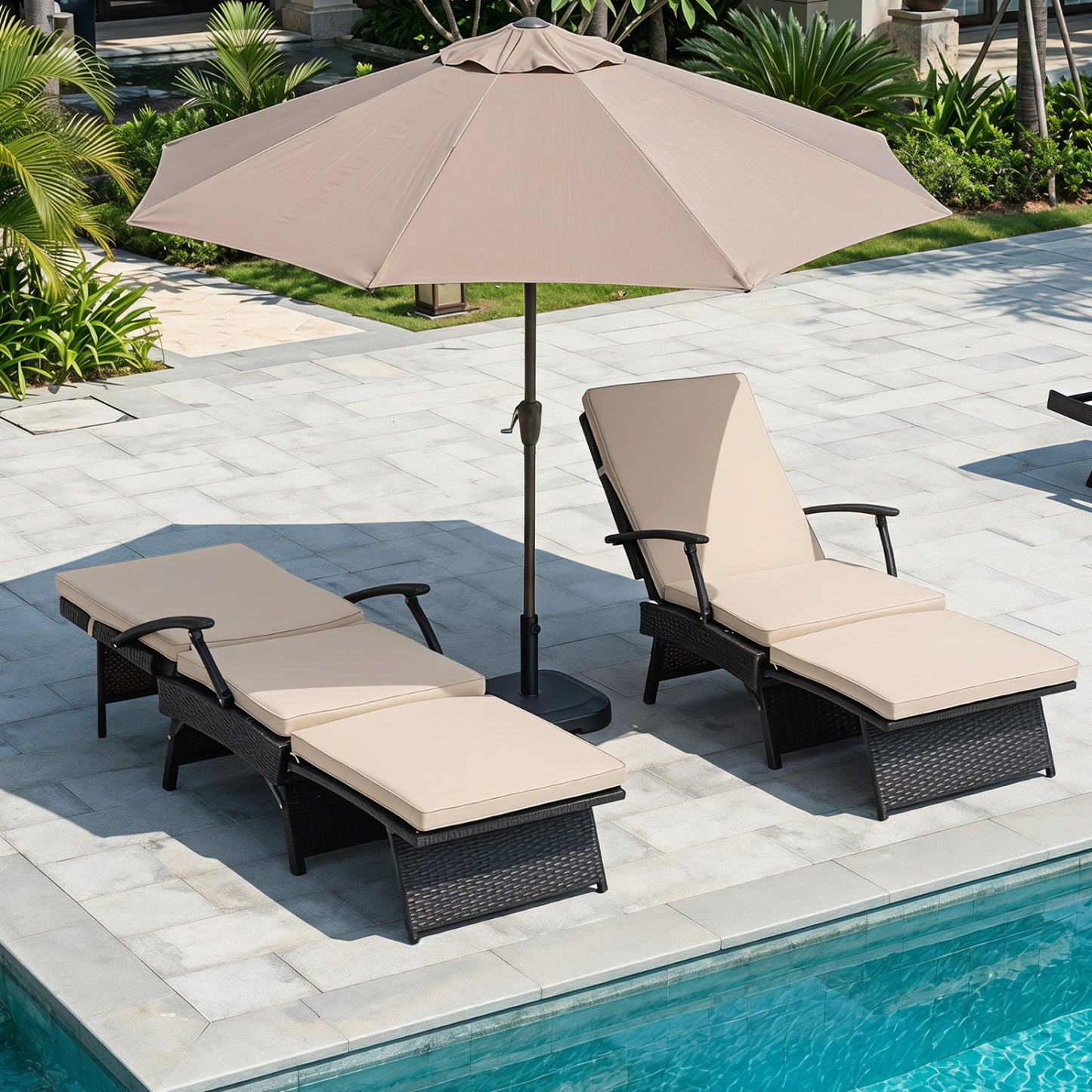 Two folding wicker chaise lounges with beige cushions under a tan umbrella on Tampa Home & Garden Store