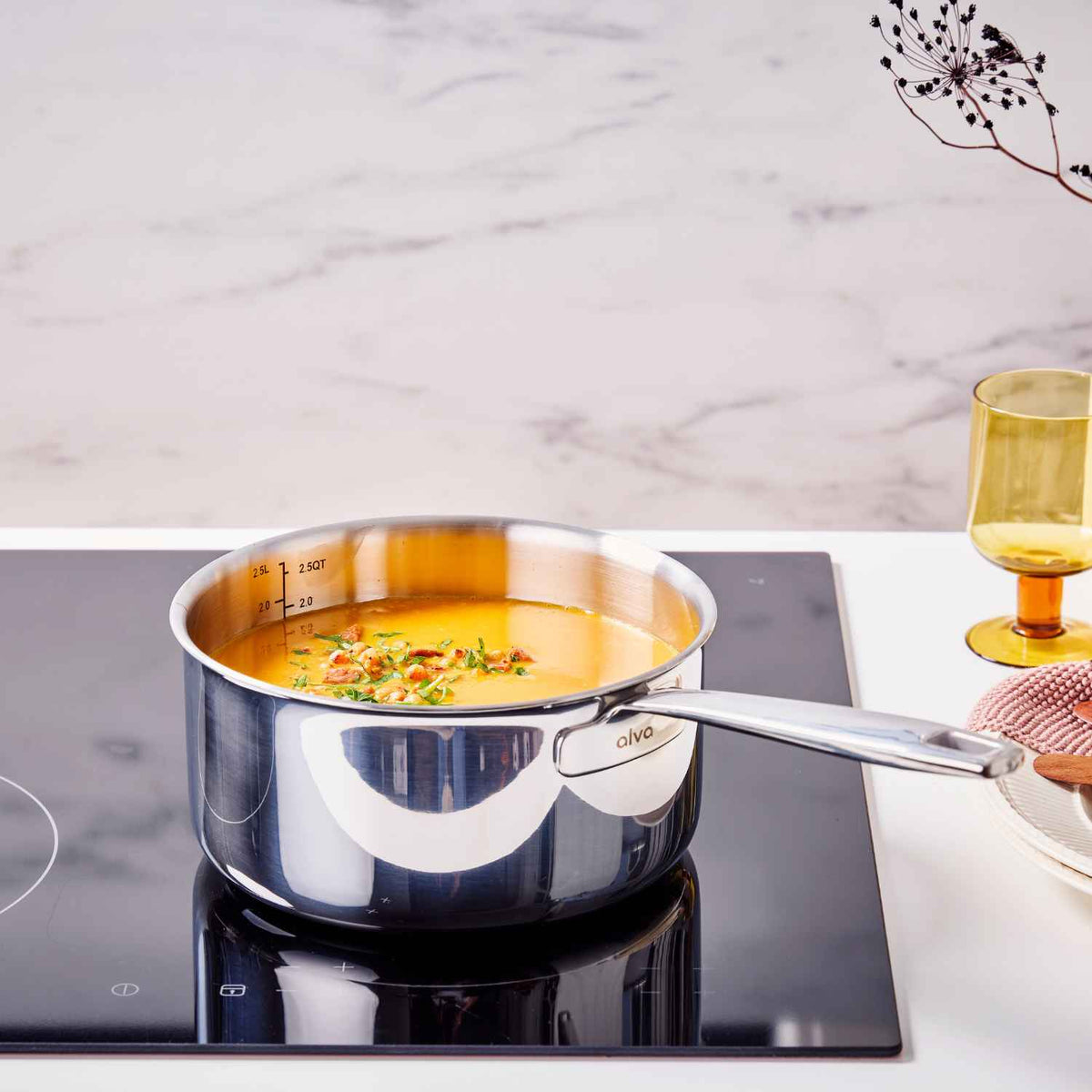 5-Ply Stainless Cookware Set, 14-Piece by Alva Cookware; polished stainless pot on glass cooktop on Tampa Home & Garden Store