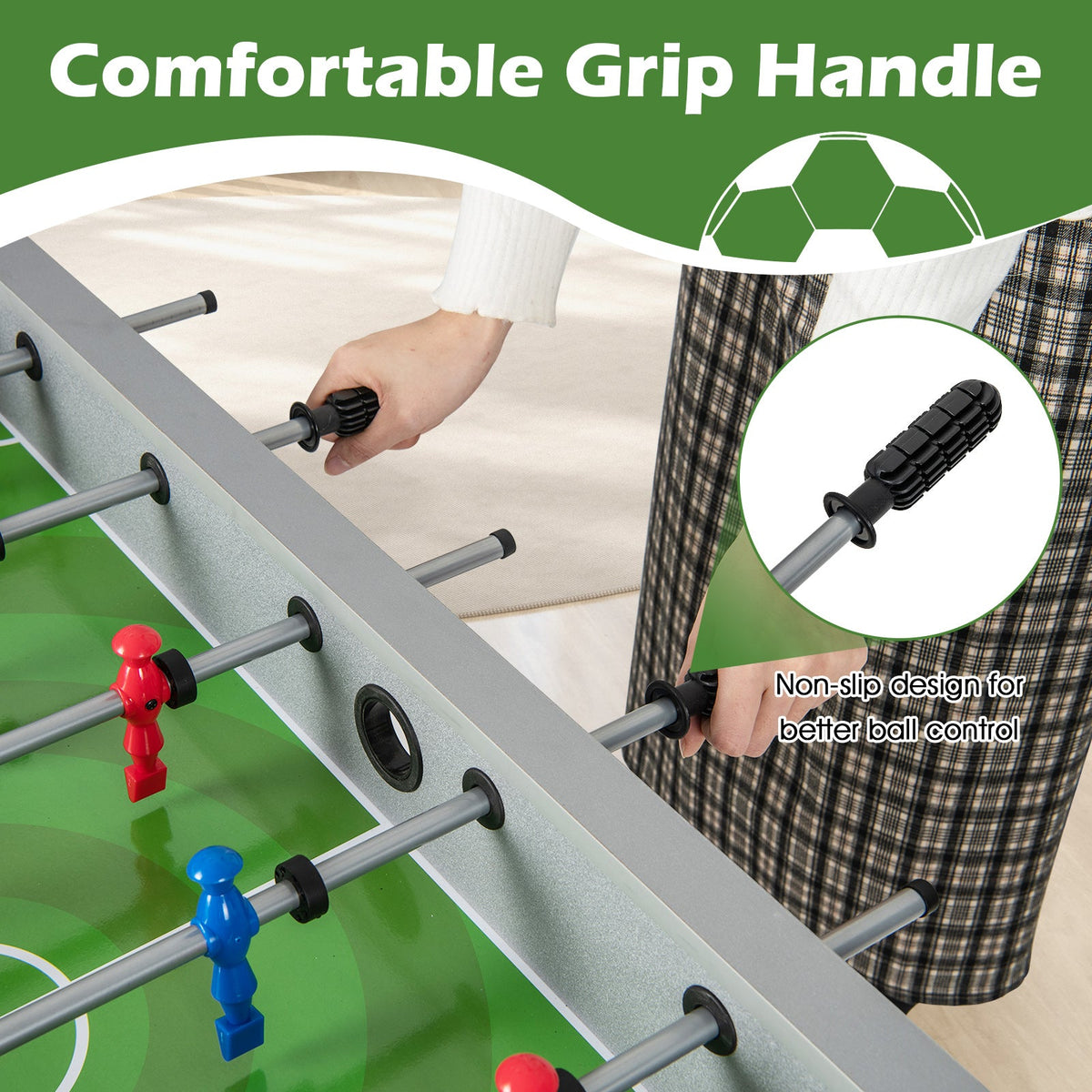 Foosball table with gray frame, red and blue players, hand gripping non-slip handle on Tampa Home & Garden Store