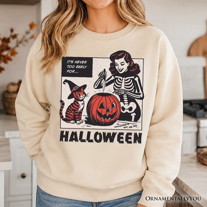 Sweatshirt It's Never Too Early Halloween with skeleton and pumpkin on cream by OrnamentallyYou on Tampa Home & Garden Store