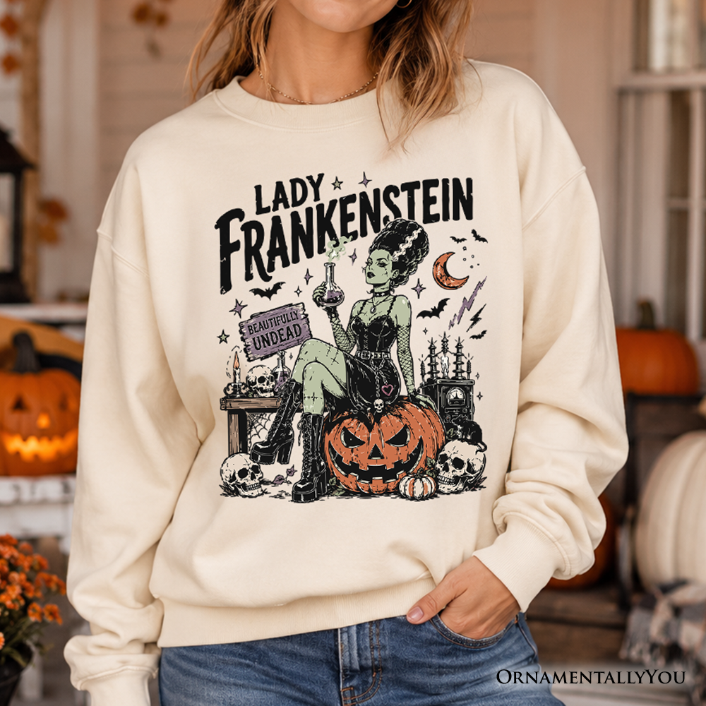 Lady Frankenstein Sweatshirt with gothic pumpkin art on cream fabric OrnamentallyYou on Tampa Home & Garden Store