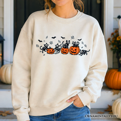 Skeleton Cats and Pumpkins Sweatshirt beige with black cat silhouettes OrnamentallyYou on Tampa Home & Garden Store