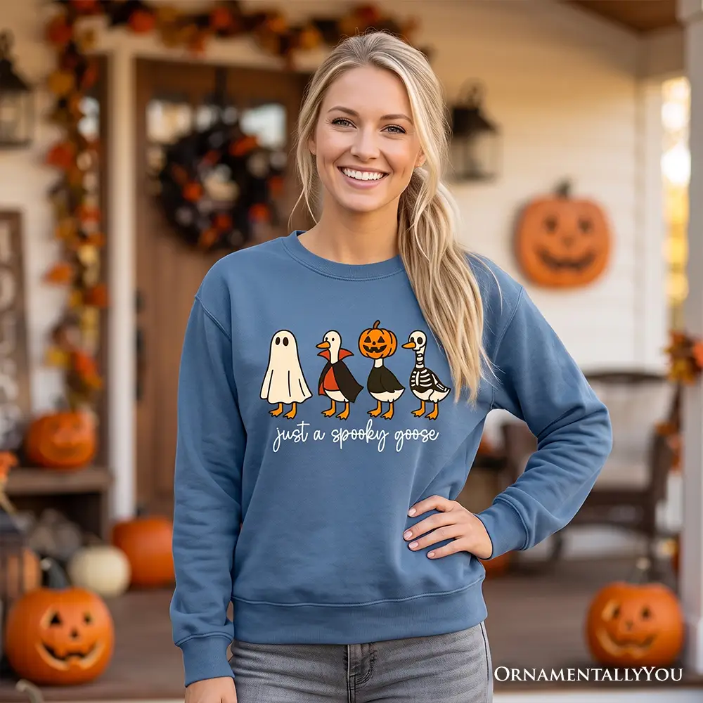 Just a Spooky Goose Sweatshirt in blue with Halloween goose graphic OrnamentallyYou on Tampa Home & Garden Store