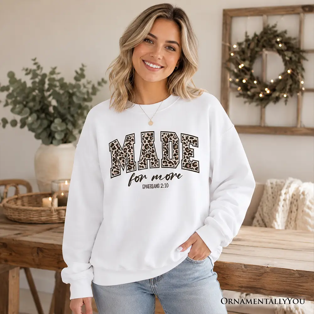 White sweatshirt with leopard-print MADE graphic and for more Ephesians 2:10, worn by model on Tampa Home & Garden Store
