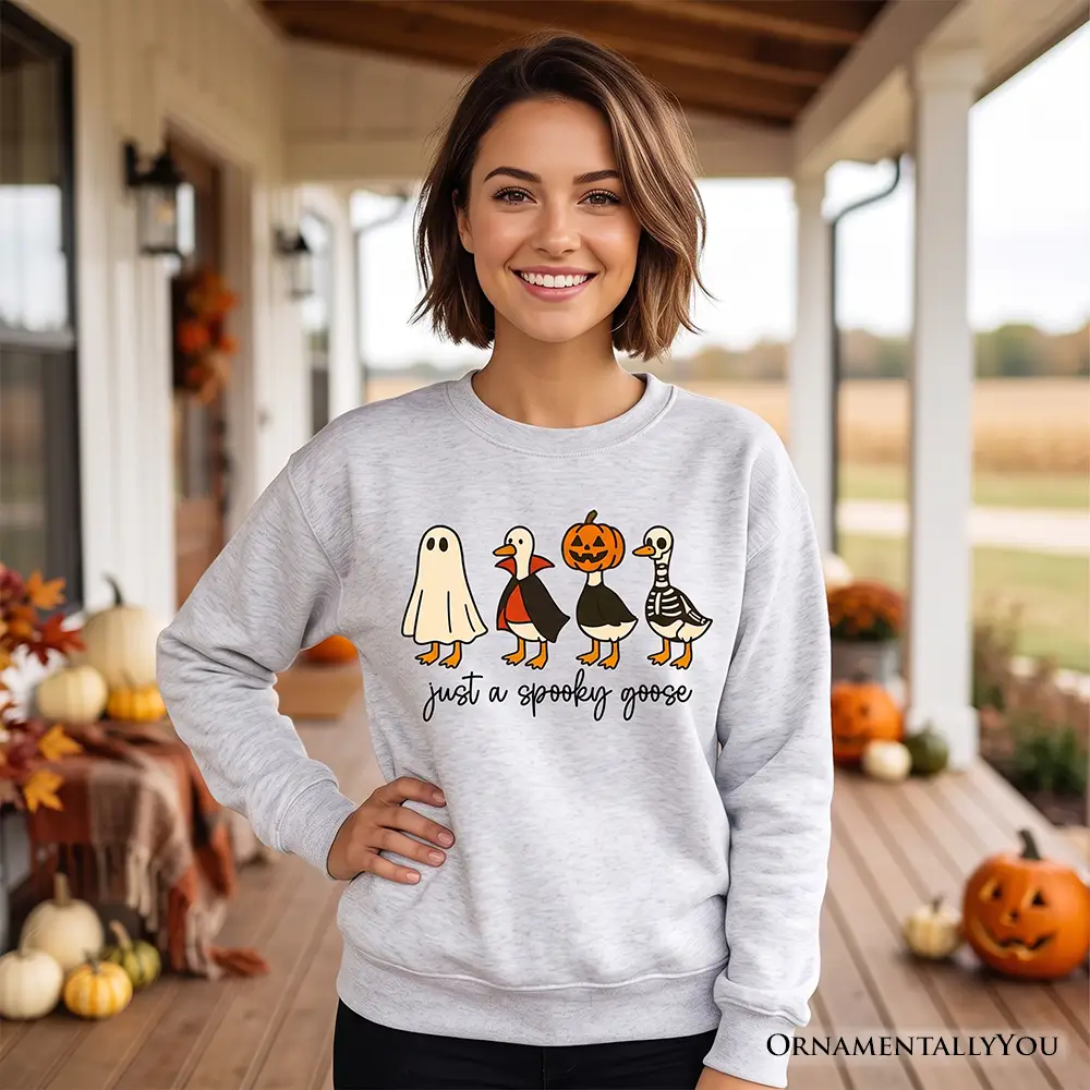 Just a Spooky Goose Sweatshirt on gray fabric with five cartoon ducks by OrnamentallyYou on Tampa Home & Garden Store