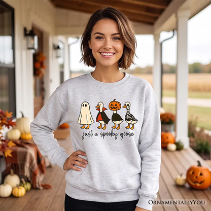 Just a Spooky Goose Sweatshirt on gray fabric with five cartoon ducks by OrnamentallyYou on Tampa Home & Garden Store