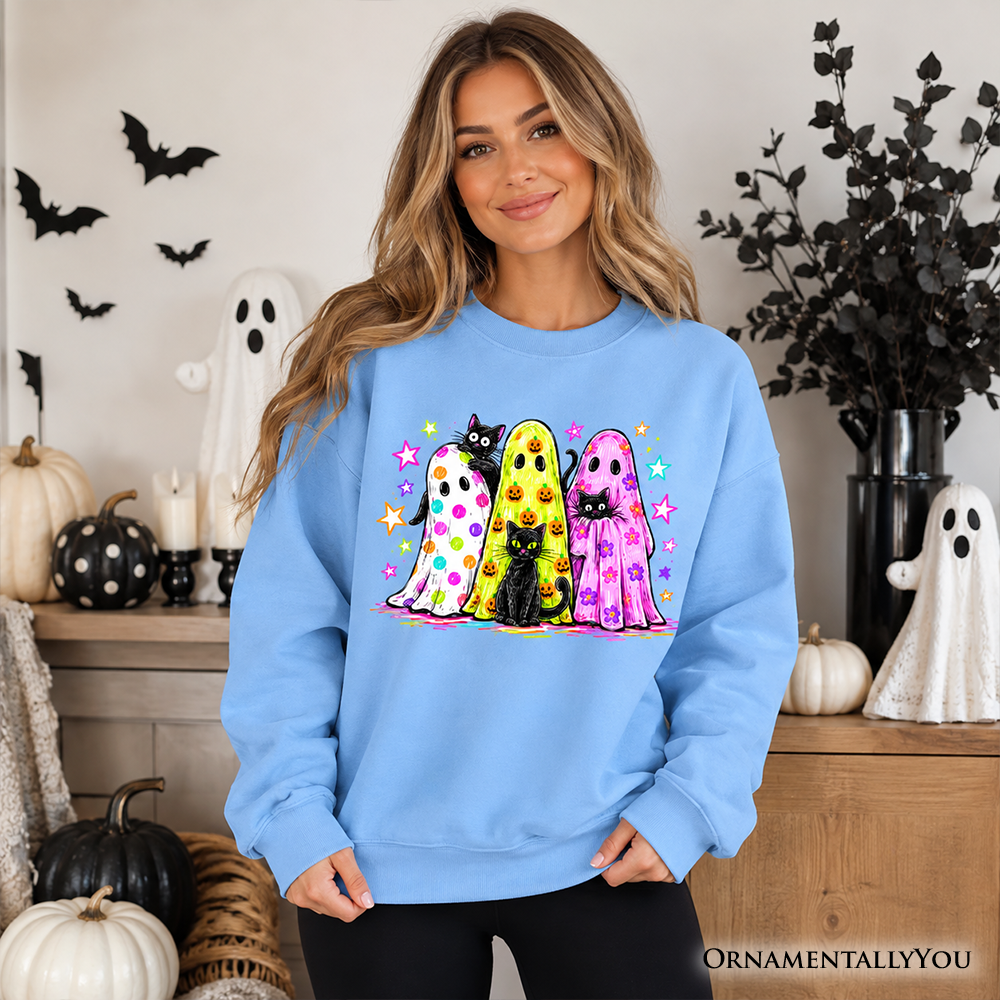 Colorful Ghosts and Black Cats Sweatshirt in light blue with neon Halloween vibe OrnamentallyYou on Tampa Home & Garden Store