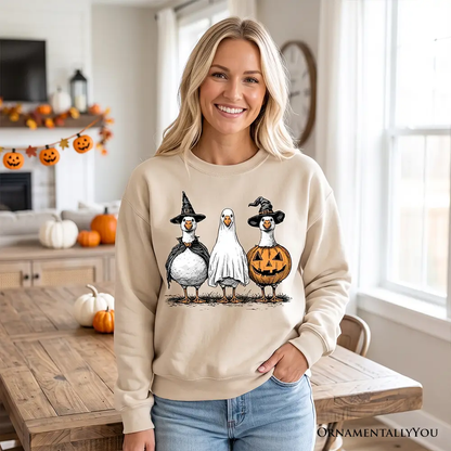 Haunting Honkers Goose Sweatshirt OrnamentallyYou beige with witch, ghost and pumpkin on Tampa Home & Garden Store