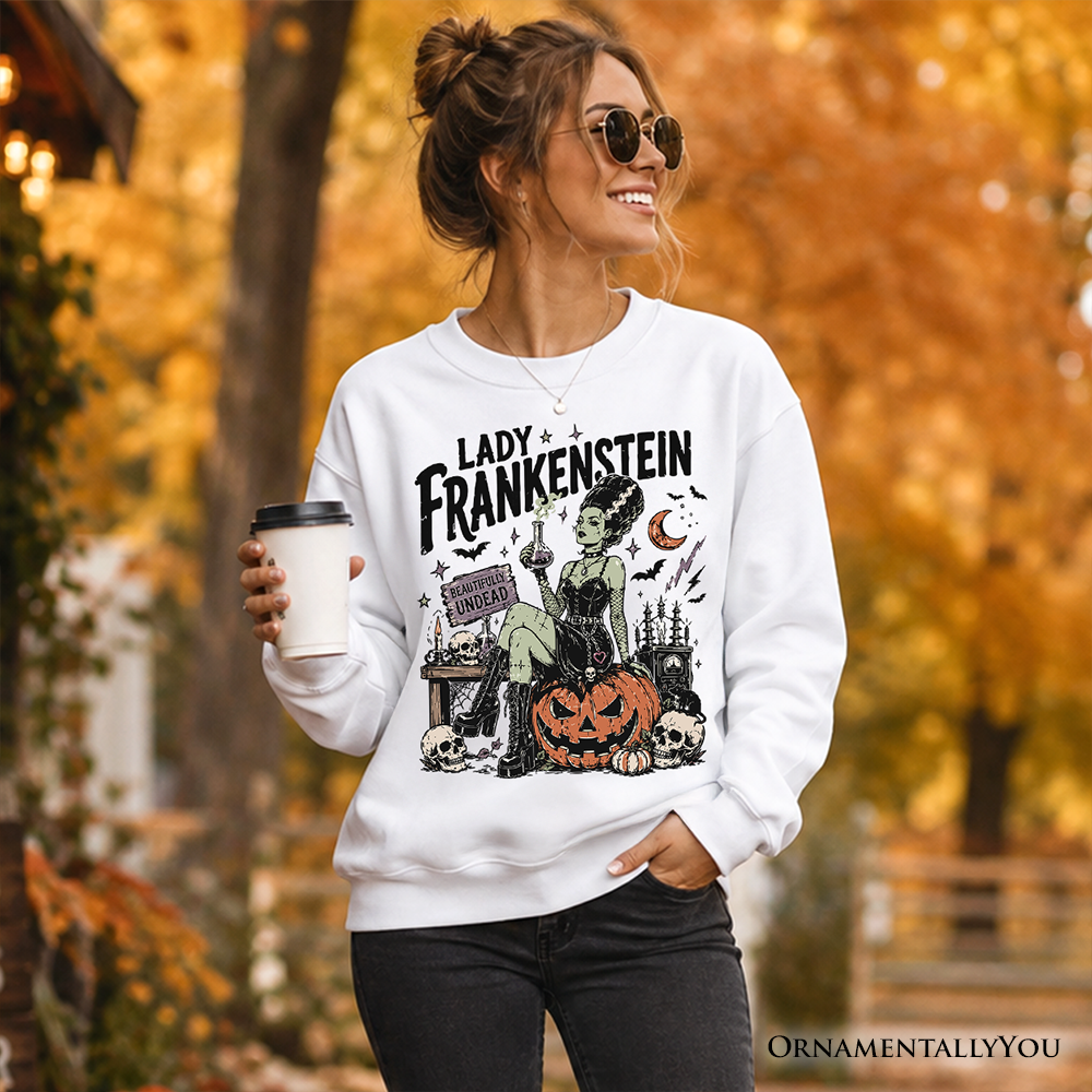 Lady Frankenstein Sweatshirt white gothic graphic with green Frankenstein OrnamentallyYou on Tampa Home & Garden Store
