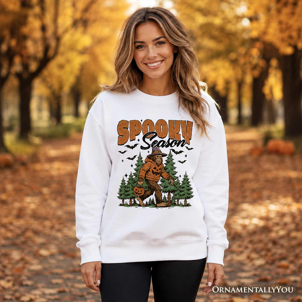 Spooky Season Bigfoot sweatshirt with pumpkin forest print on white fabric OrnamentallyYou on Tampa Home & Garden Store