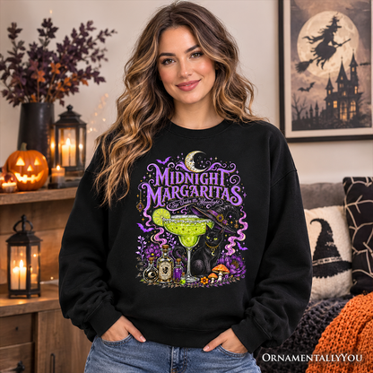 Midnight Margaritas Sweatshirt by OrnamentallyYou; black crewneck with witchy cocktail art on Tampa Home & Garden Store