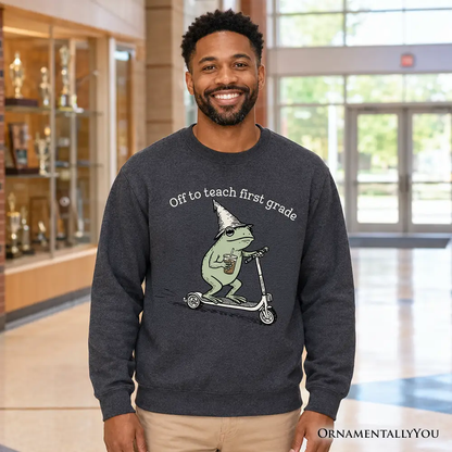 Off to Teach First Grade Frog Sweatshirt with frog on scooter graphic in gray OrnamentallyYou on Tampa Home & Garden Store