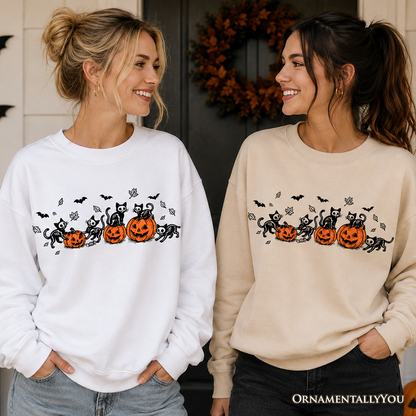 Skeleton Cats and Pumpkins Sweatshirts in white and beige with orange pumpkins OrnamentallyYou on Tampa Home & Garden Store