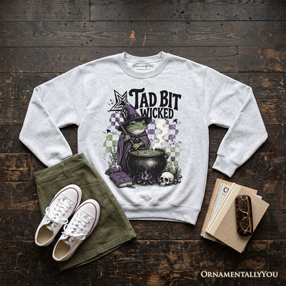 Tad Bit Wicked Frog Witch Sweatshirt by OrnamentallyYou, heather gray with cauldron witch art on Tampa Home & Garden Store