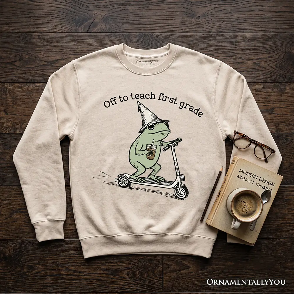 Off to Teach First Grade Frog Sweatshirt beige with a green frog on a scooter, OrnamentallyYou on Tampa Home & Garden Store