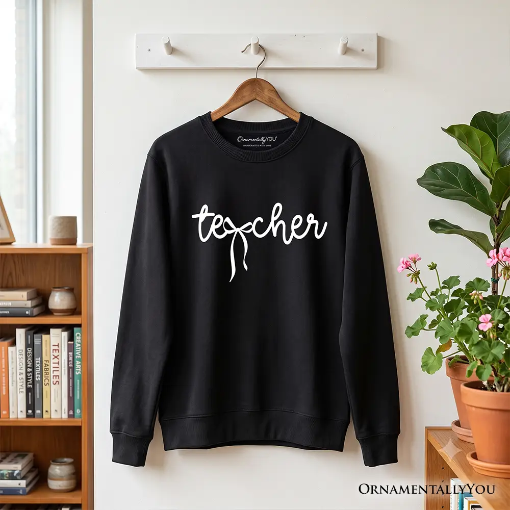 Black OrnamentallyYou sweatshirt with white teacher script and bow detail on Tampa Home & Garden Store