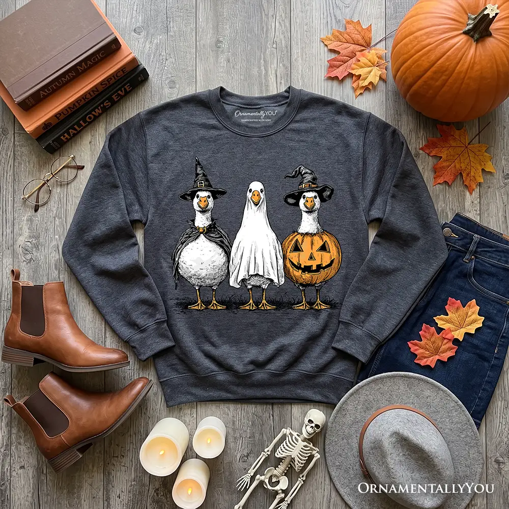 Haunting Honkers Goose Sweatshirt in dark gray with witch, ghost, pumpkin geese OrnamentallyYou on Tampa Home & Garden Store