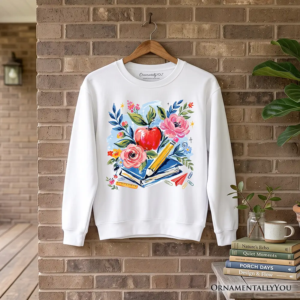 Boho Floral Teacher Sweatshirt by OrnamentallyYou white with watercolor apple, flowers and books on Tampa Home & Garden Store