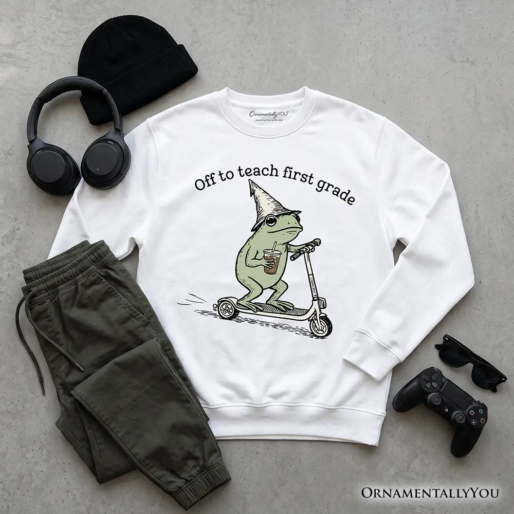 Off to Teach First Grade Frog Sweatshirt white with frog on scooter graphic OrnamentallyYou on Tampa Home & Garden Store