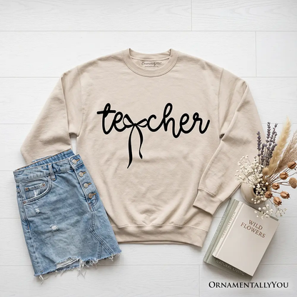 Teacher Coquette Bow Sweatshirt beige by OrnamentallyYou with black script, denim skirt styling on Tampa Home & Garden Store