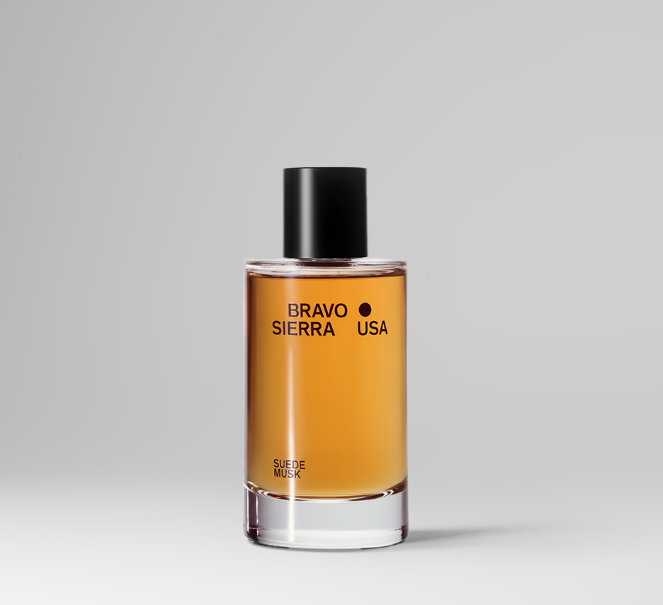 Body fragrance bottle Bravo Sierra suede musk, amber liquid, black cap on Tampa Home & Garden Store