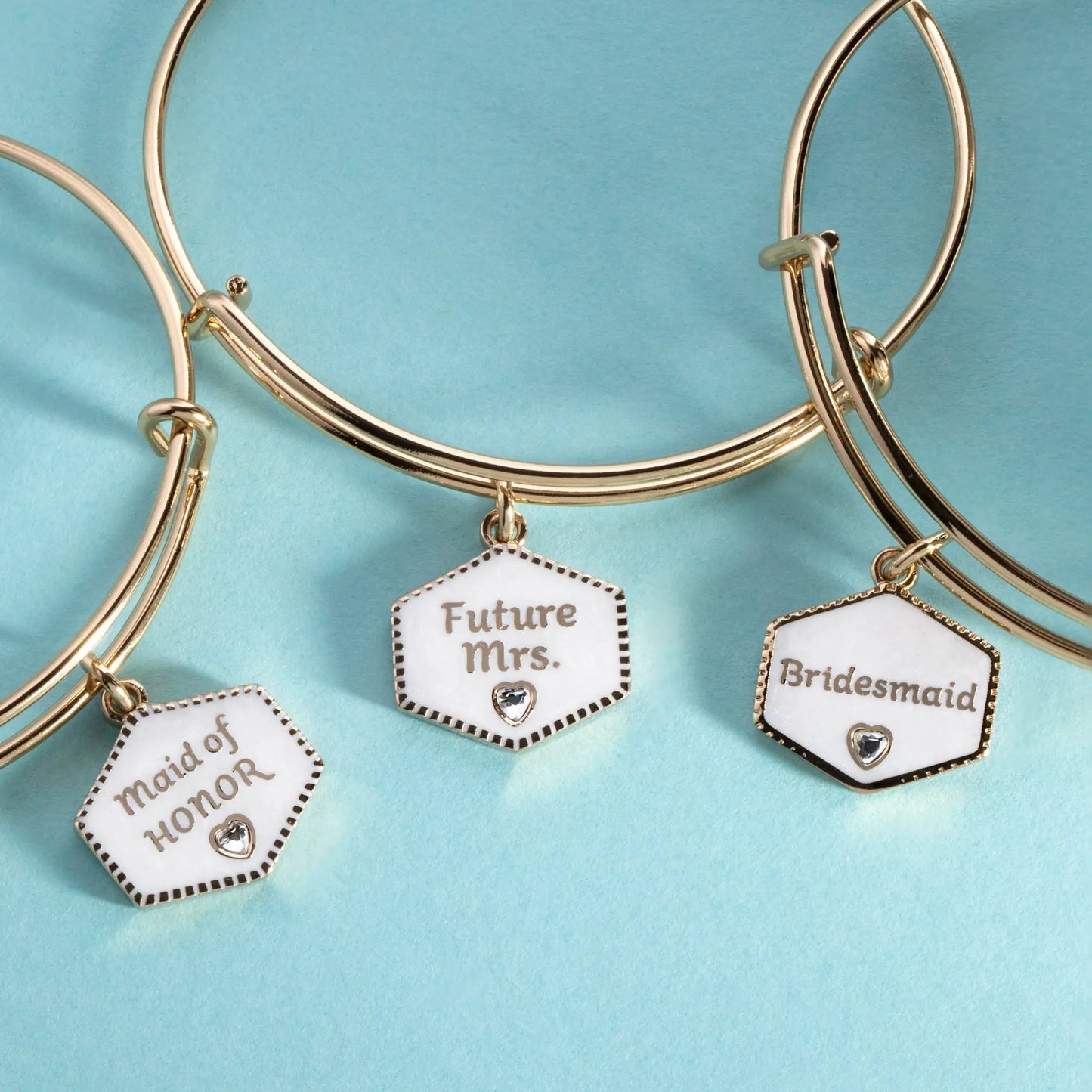 Alex and Ani Maid of Honor bangle set with gold-tone hoops and white enamel hex charms on Tampa Home & Garden Store