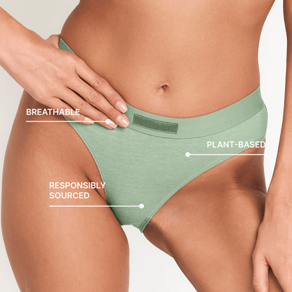 Mid-Rise Hemp Brief by Net Positive in sage green on model on Tampa Home & Garden Store