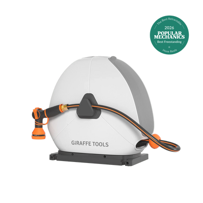 Ground-mounted retractable hose reel 82 ft by Giraffe Tools with orange hose on Tampa Home & Garden Store