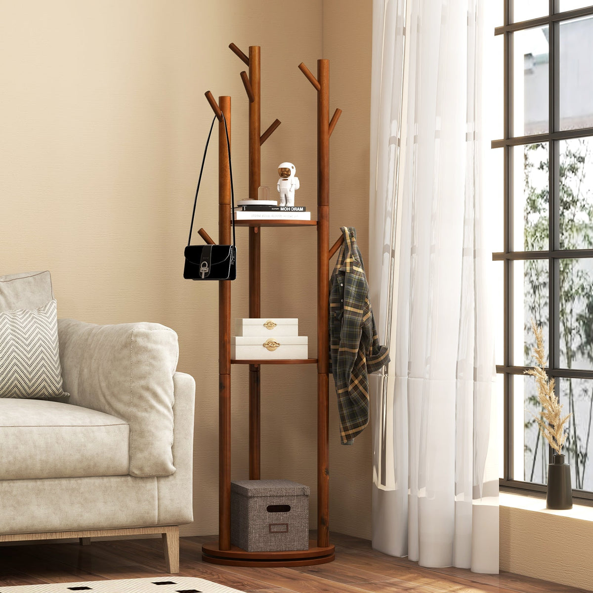 Freestanding wooden coat tree with 3 shelves and 9 hooks in walnut finish, handbag by window on Tampa Home & Garden Store