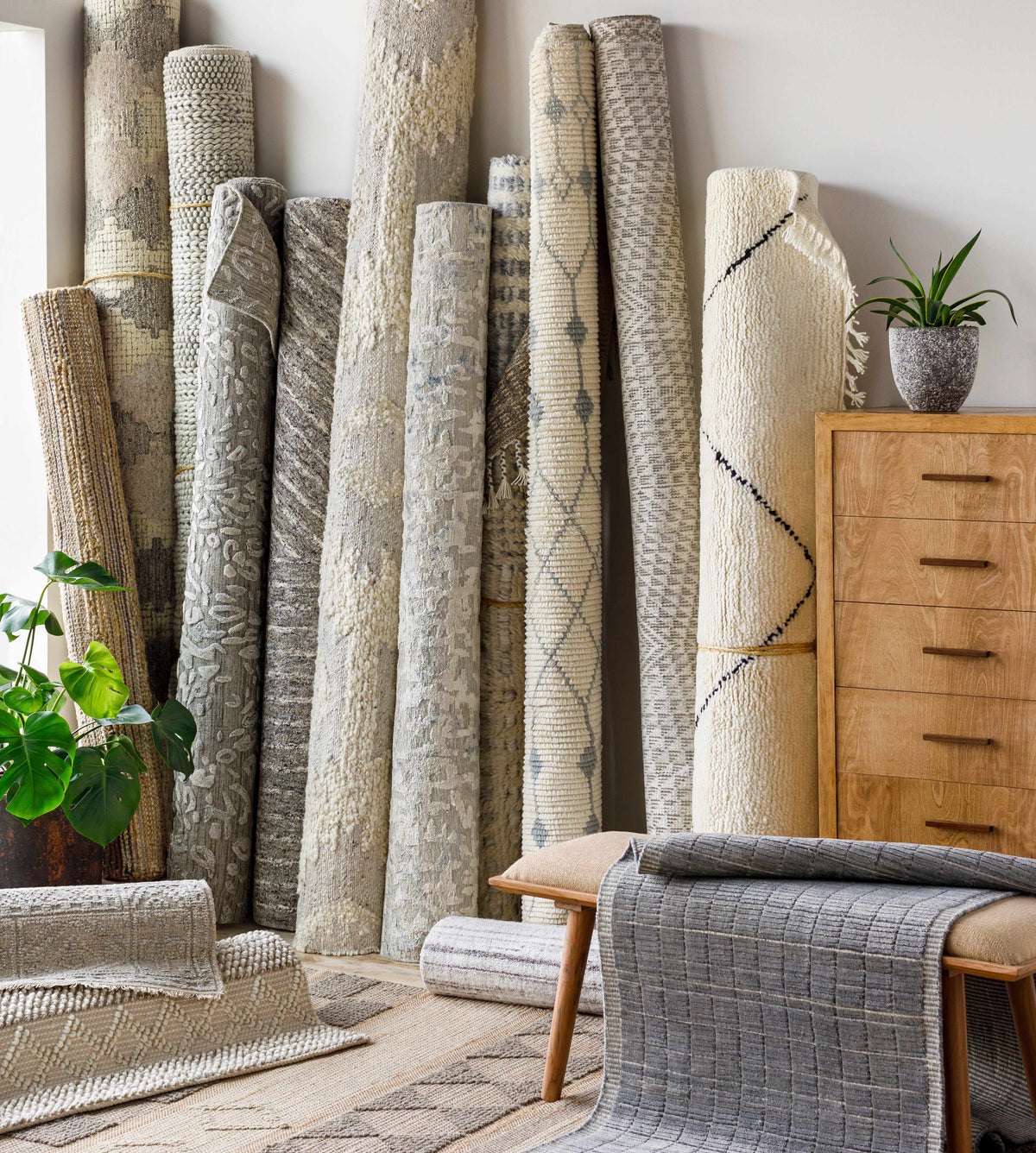 Cayuga Area Rug by Boutique Rugs, neutral-toned rolled rugs with subtle textures on Tampa Home & Garden Store