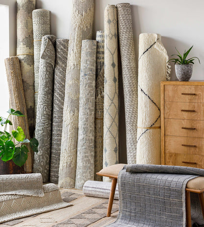 Cayuga Area Rug by Boutique Rugs, neutral-toned rolled rugs with subtle textures on Tampa Home & Garden Store