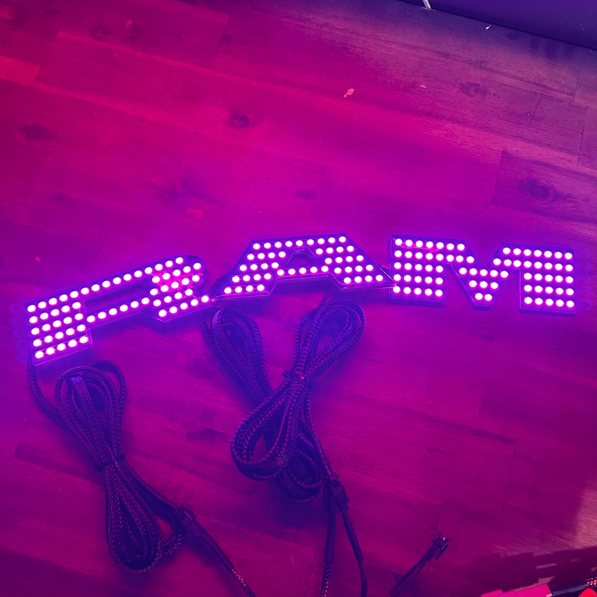 RAM RGBW Flow LED badge emblems for interior/exterior vehicle lighting AutoLEDTech.com on Tampa Home & Garden Store