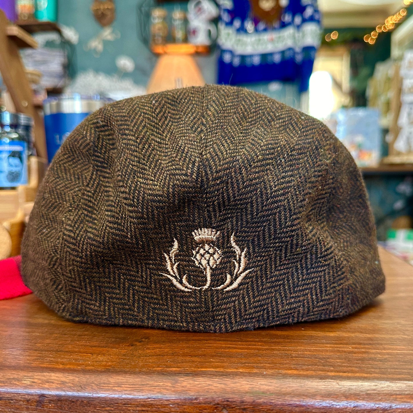 Casquette de golf en laine mélangée avec broderie de chardon écossais et chevrons