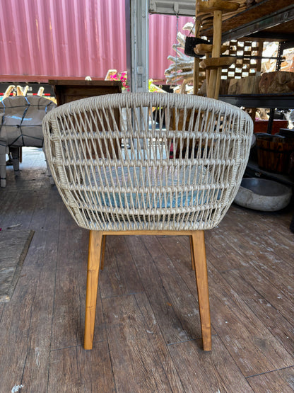 Synthetic rope and teak arm chair with blue cushion and teak legs on Tampa Home & Garden Store