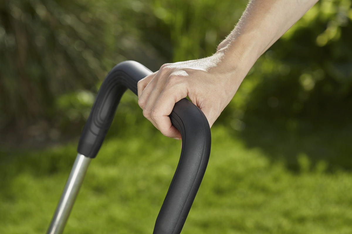 Hose trolley CleverRoll M Easy metal frame with black handle in garden on Tampa Home & Garden Store