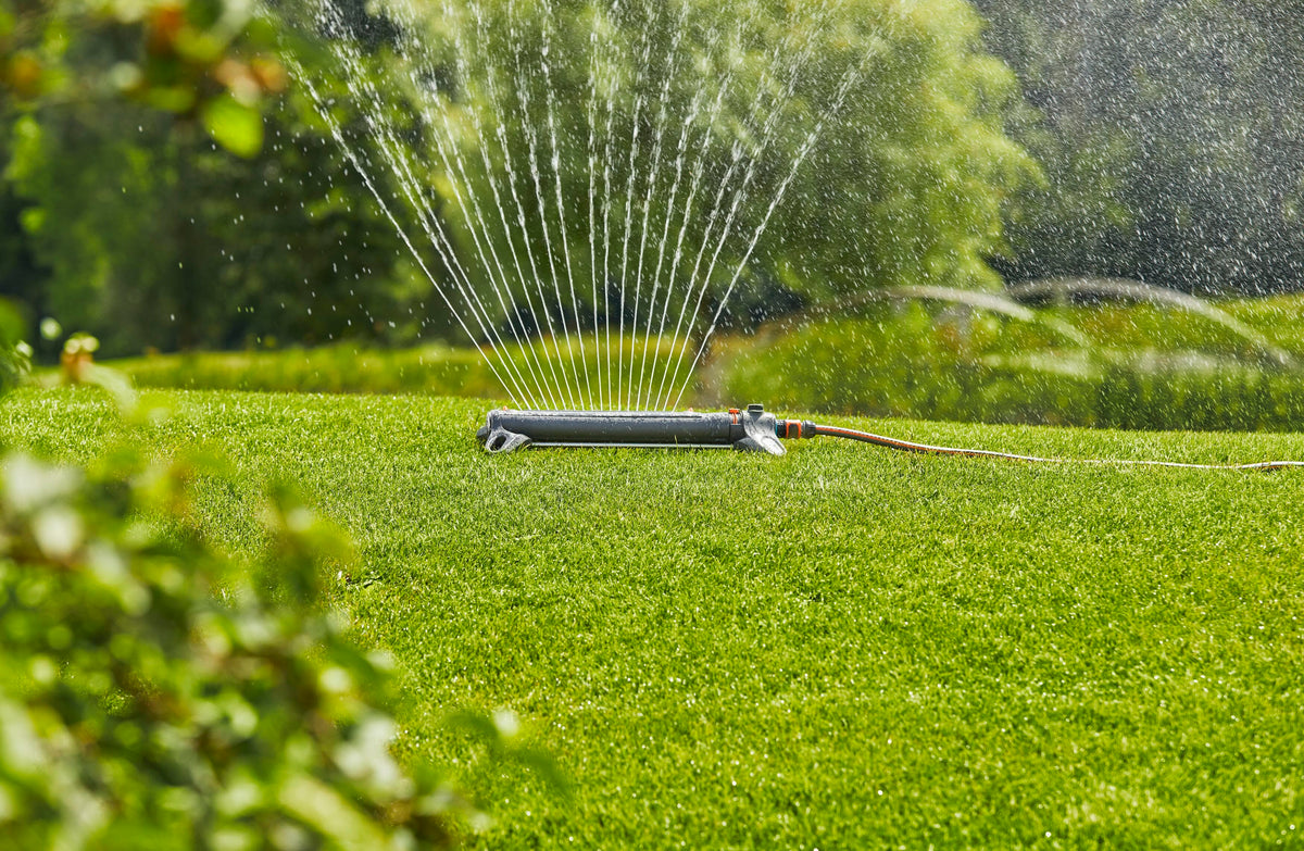 AquaZoom Oscillating Sprinkler Gardena gray plastic lawn sprinkler with multiple nozzles on Tampa Home & Garden Store
