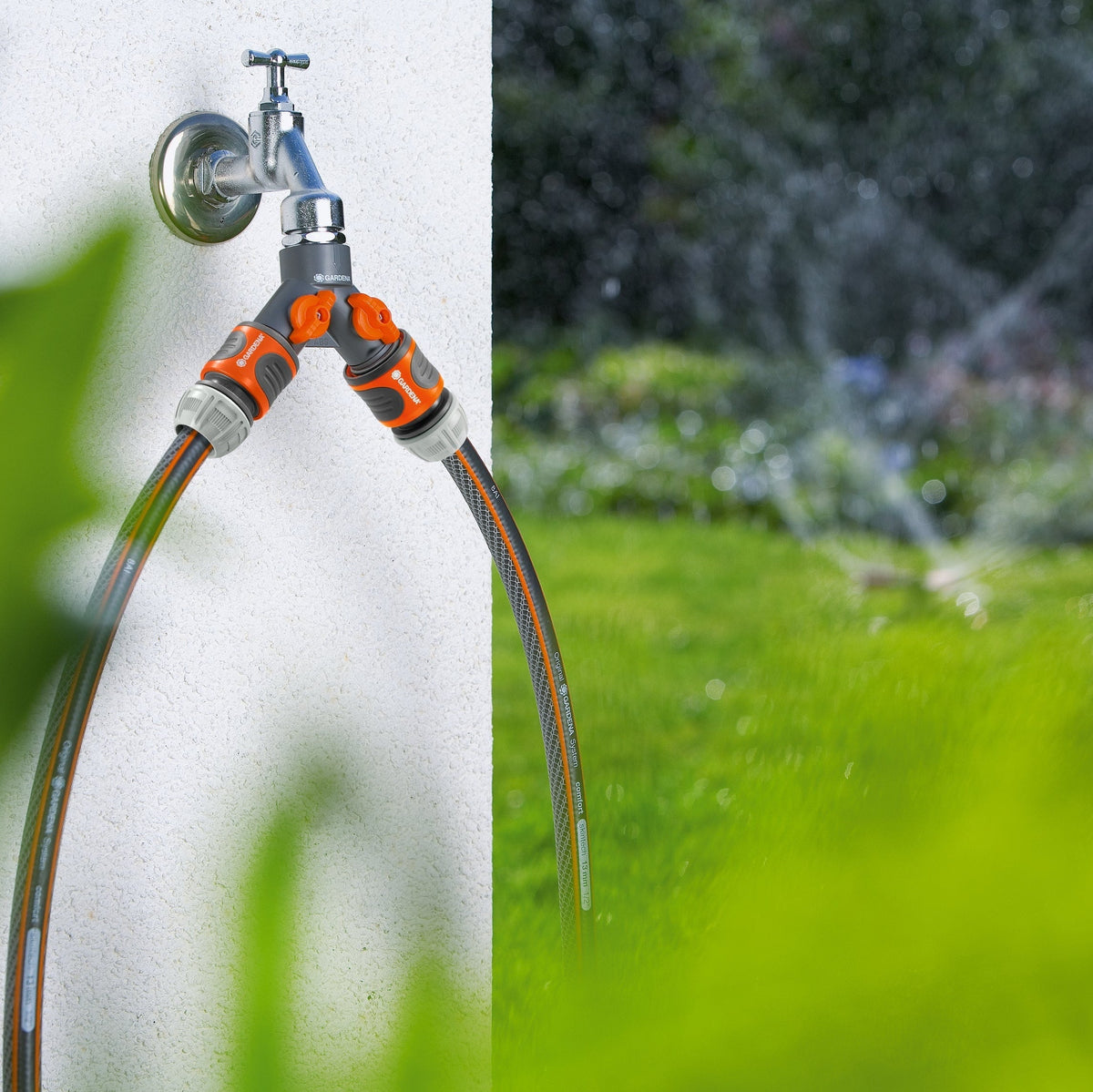 Gardena Twin-Tap Connector 26,5 mm garden hose splitter with dual outlets wall-mounted on Tampa Home & Garden Store