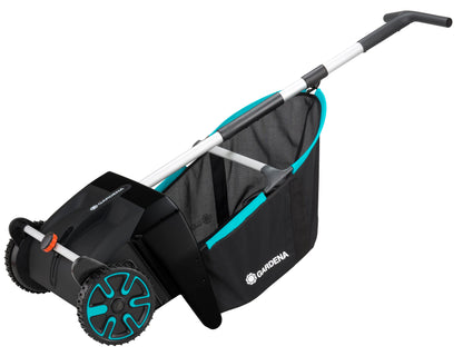 Leaf and Lawn Collector lawn sweeper by Gardena with teal bag trim and large teal wheels on Tampa Home & Garden Store