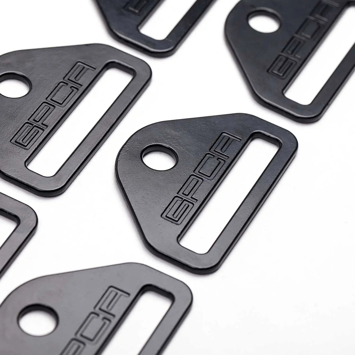 GPCA tie-down D-plate, black metal car gear with round mounting hole and elongated slot on Tampa Home & Garden Store